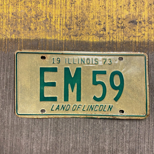 Photo of a 1973 Illinois License Plate Auto Tag Garage Decor Vintage EM 59 with original patina