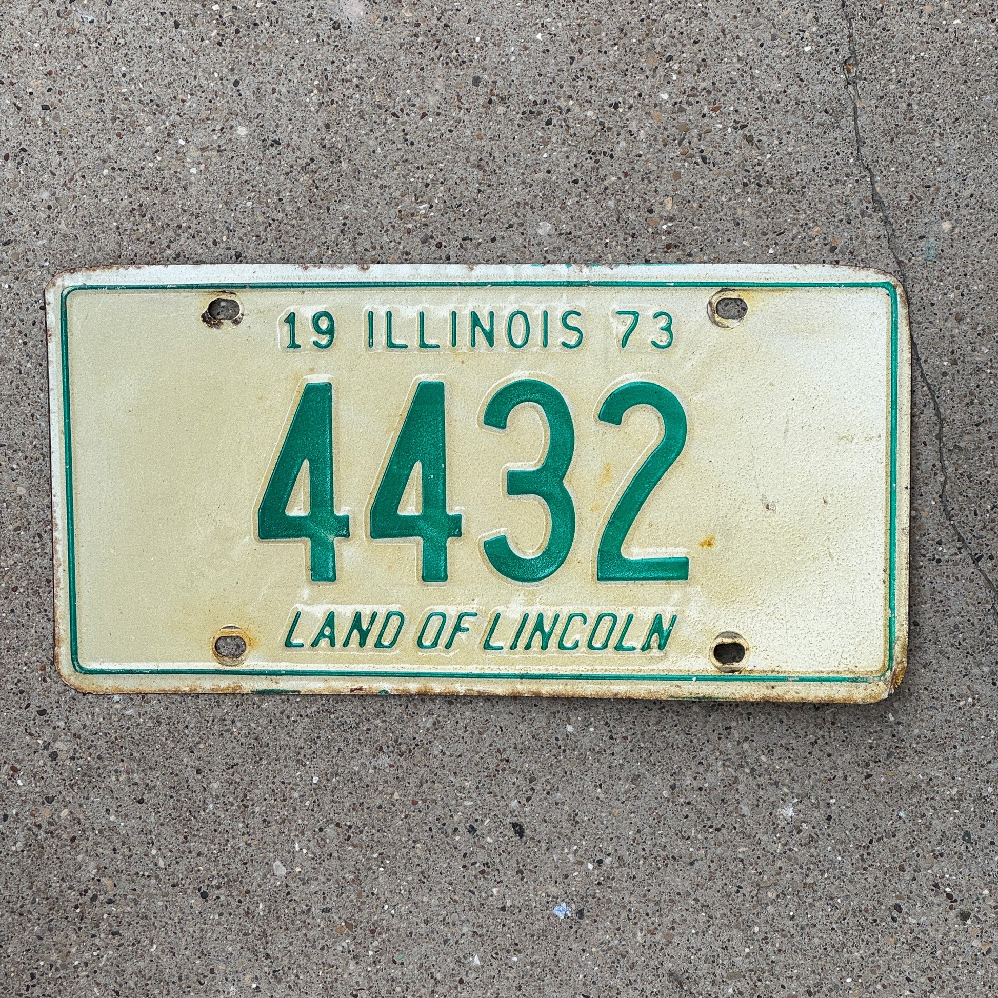 Photo of a 1973 Illinois License Plate Auto Tag Garage Decor Vintage Low Number Four Digit 4432 with original patina