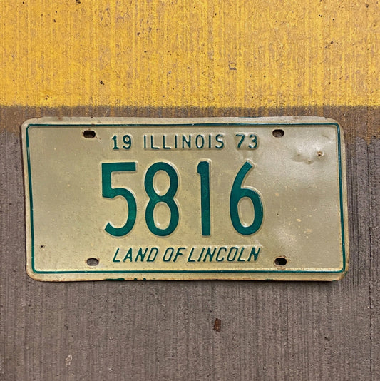 Photo of a 1973 Illinois License Plate Auto Tag Garage Decor Vintage Low Number Four Digit 5816 with original patina