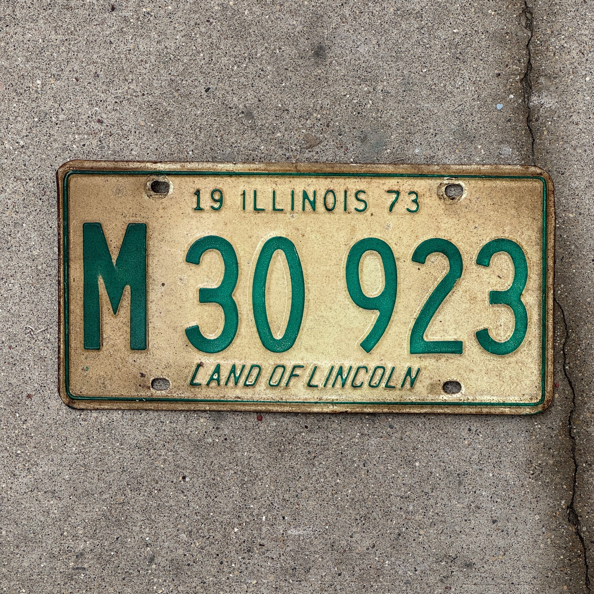 Photo of a 1973 Illinois Municipal License Plate Auto Tag 1 Vintage Garage M 30 923 with original patina