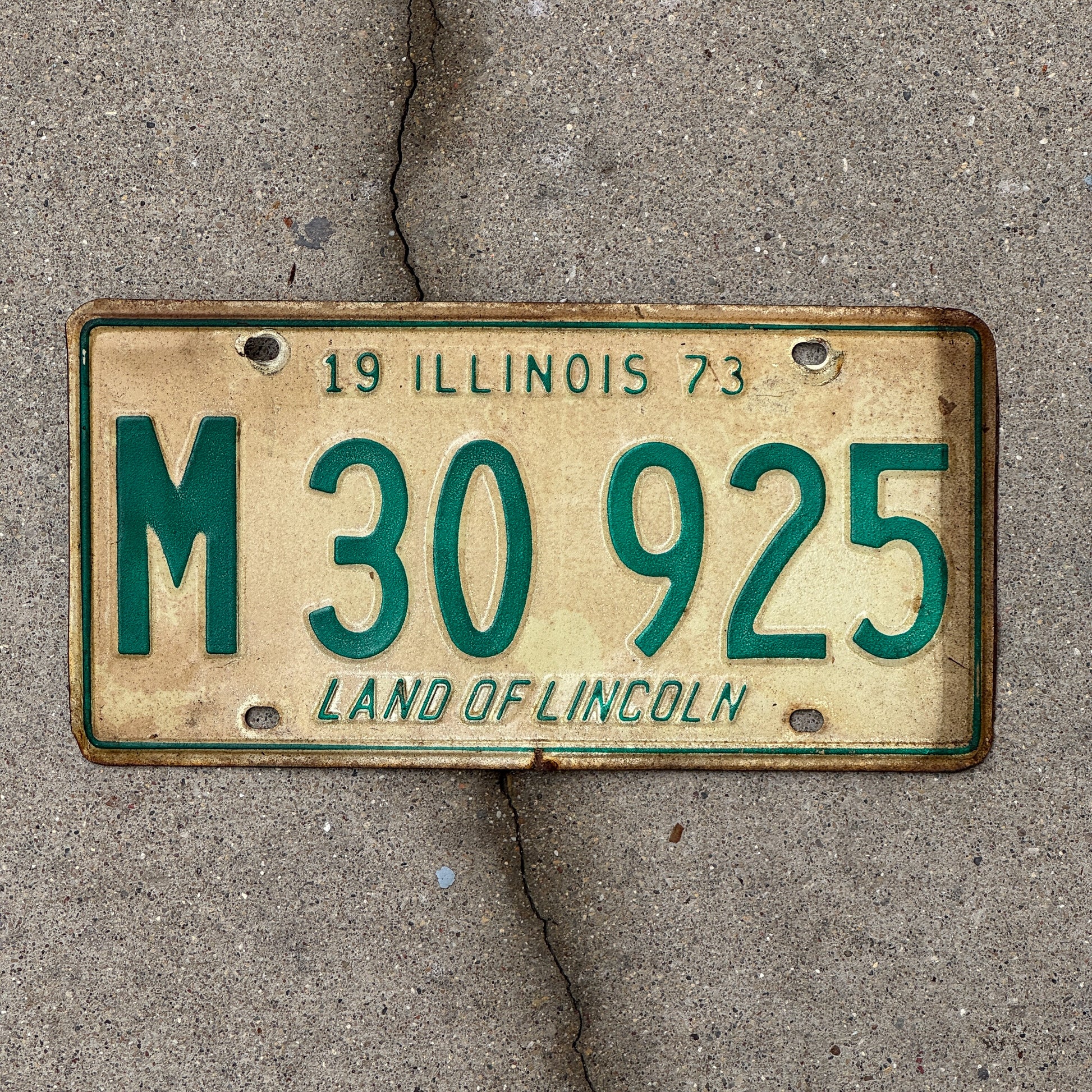 Photo of a 1973 Illinois Municipal License Plate Auto Tag 1 Vintage Garage M 30 925 with original patina