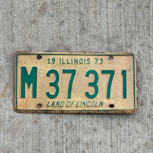 Photo of a 1973 Illinois Municipal License Plate Auto Tag 1 Vintage Garage M 37 371 with original patina