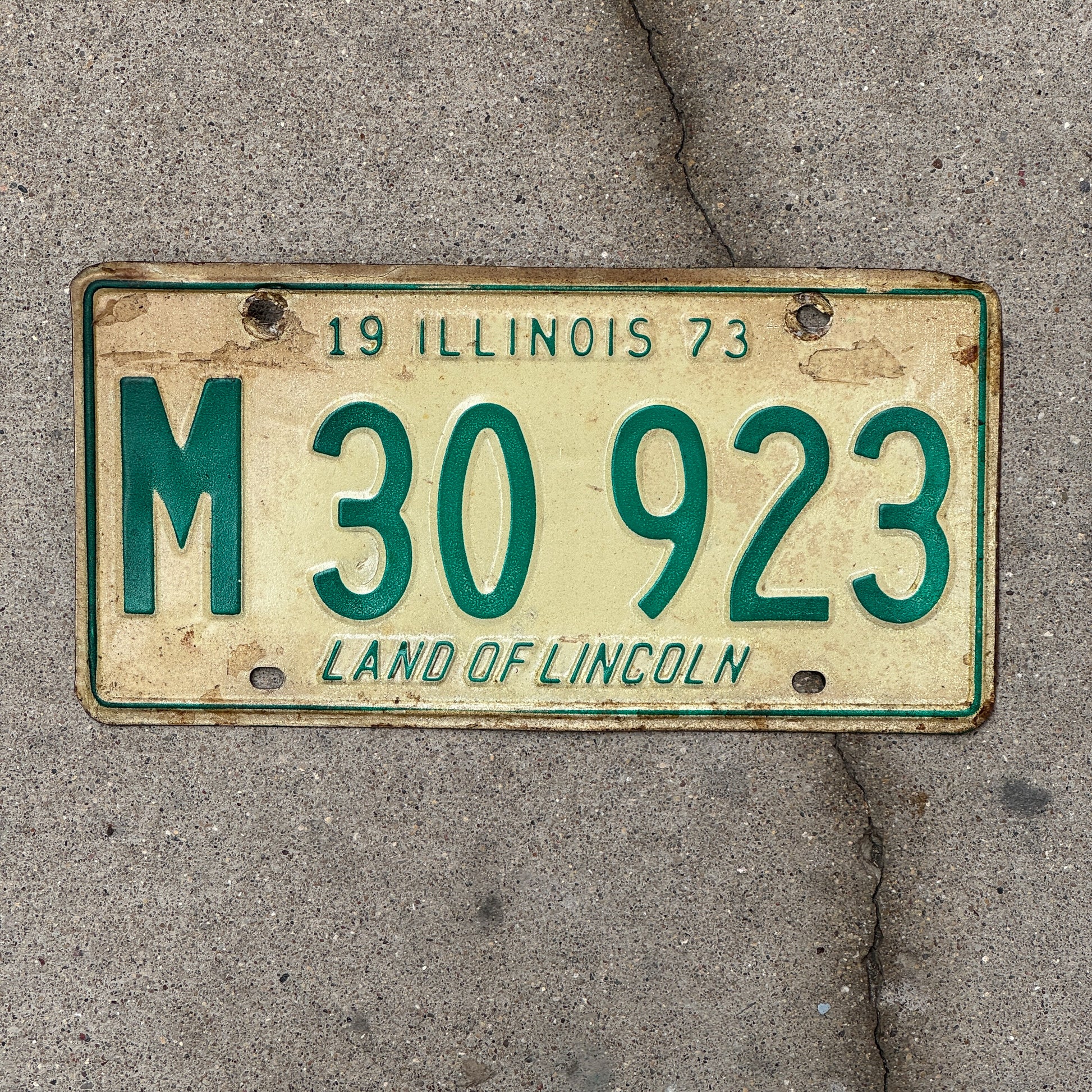 Photo of a 1973 Illinois Municipal License Plate Auto Tag 2 Vintage Garage M 30 923 with original patina