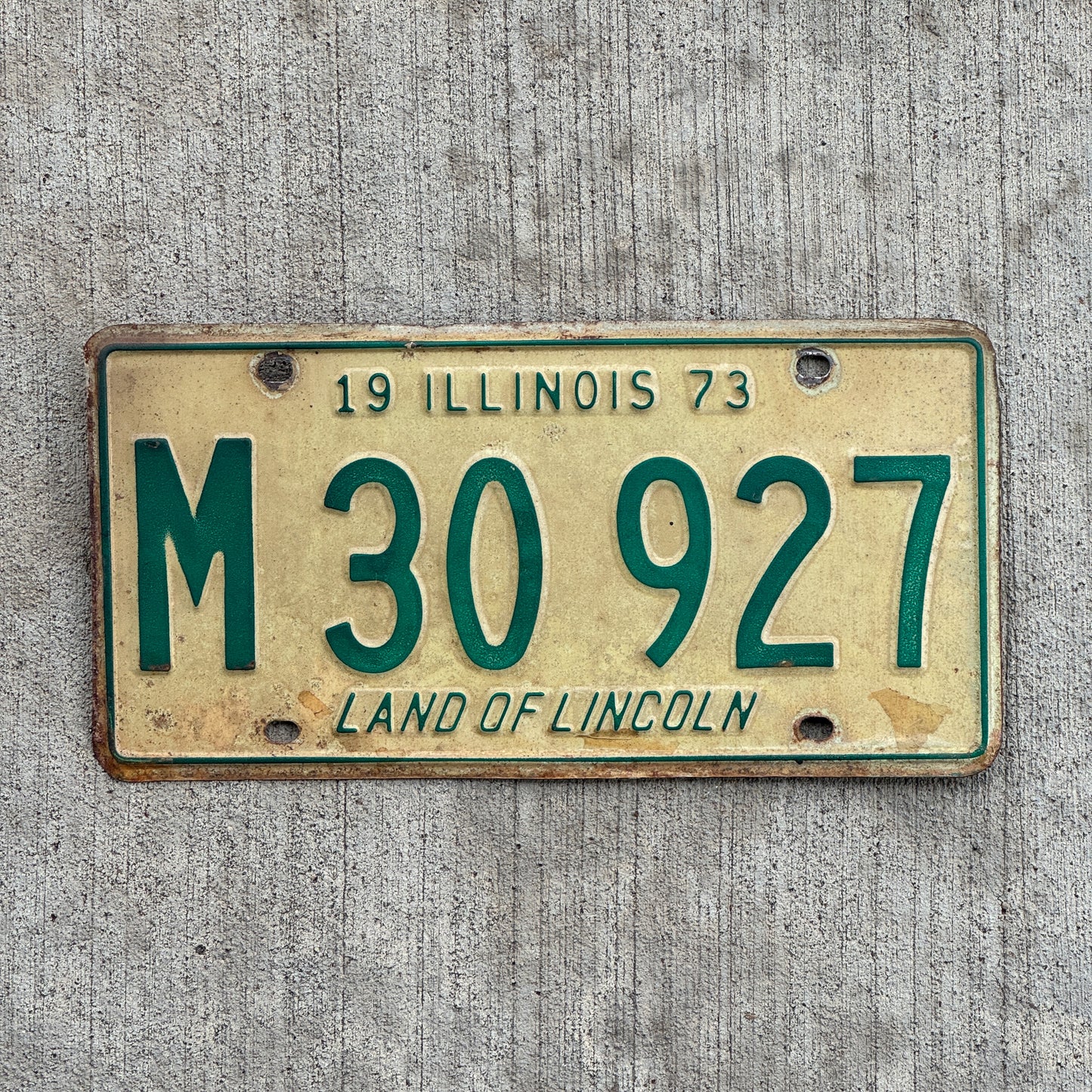 Photo of a 1973 Illinois Municipal License Plate Auto Tag 2 Vintage Garage M 30 927 with original patina