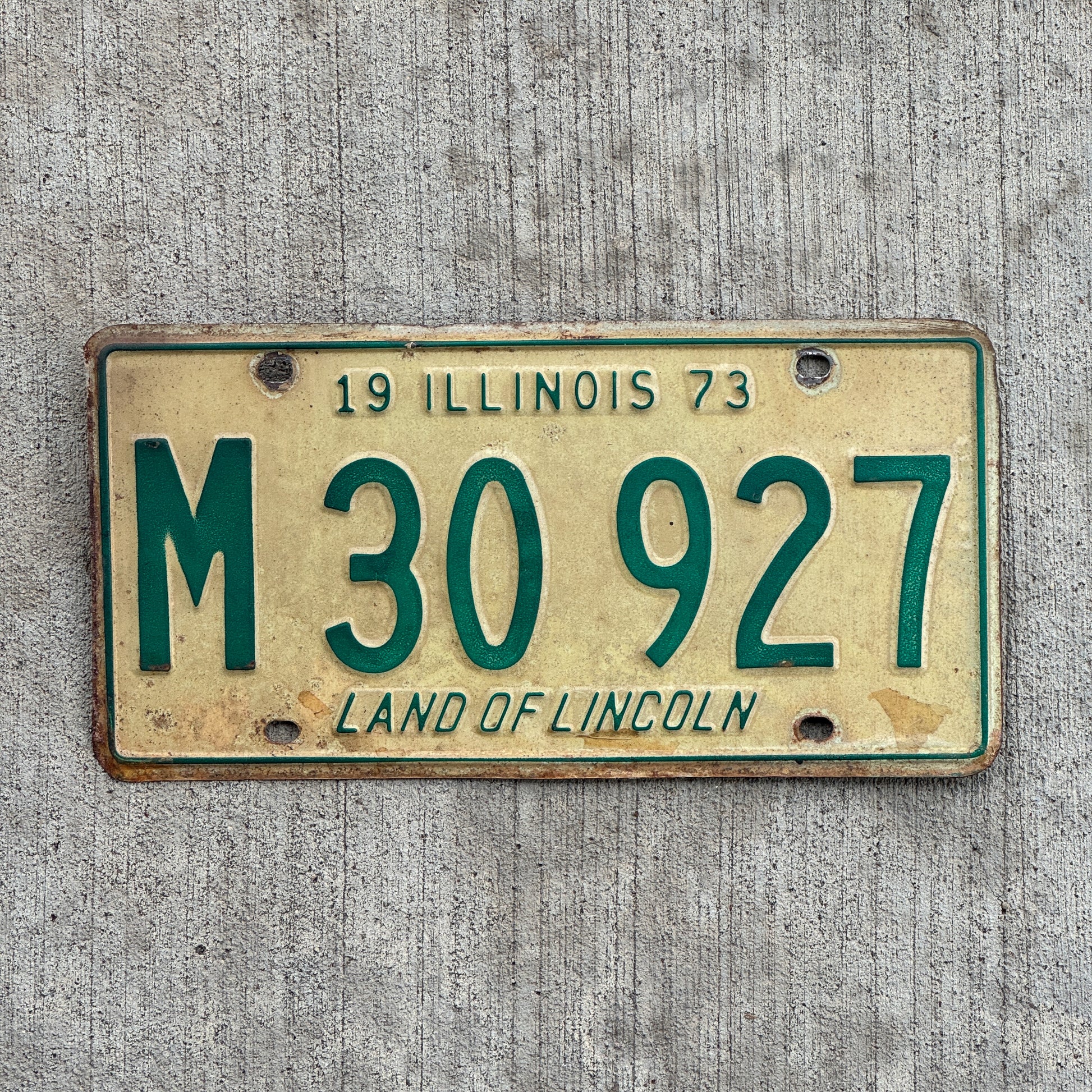 Photo of a 1973 Illinois Municipal License Plate Auto Tag 2 Vintage Garage M 30 927 with original patina