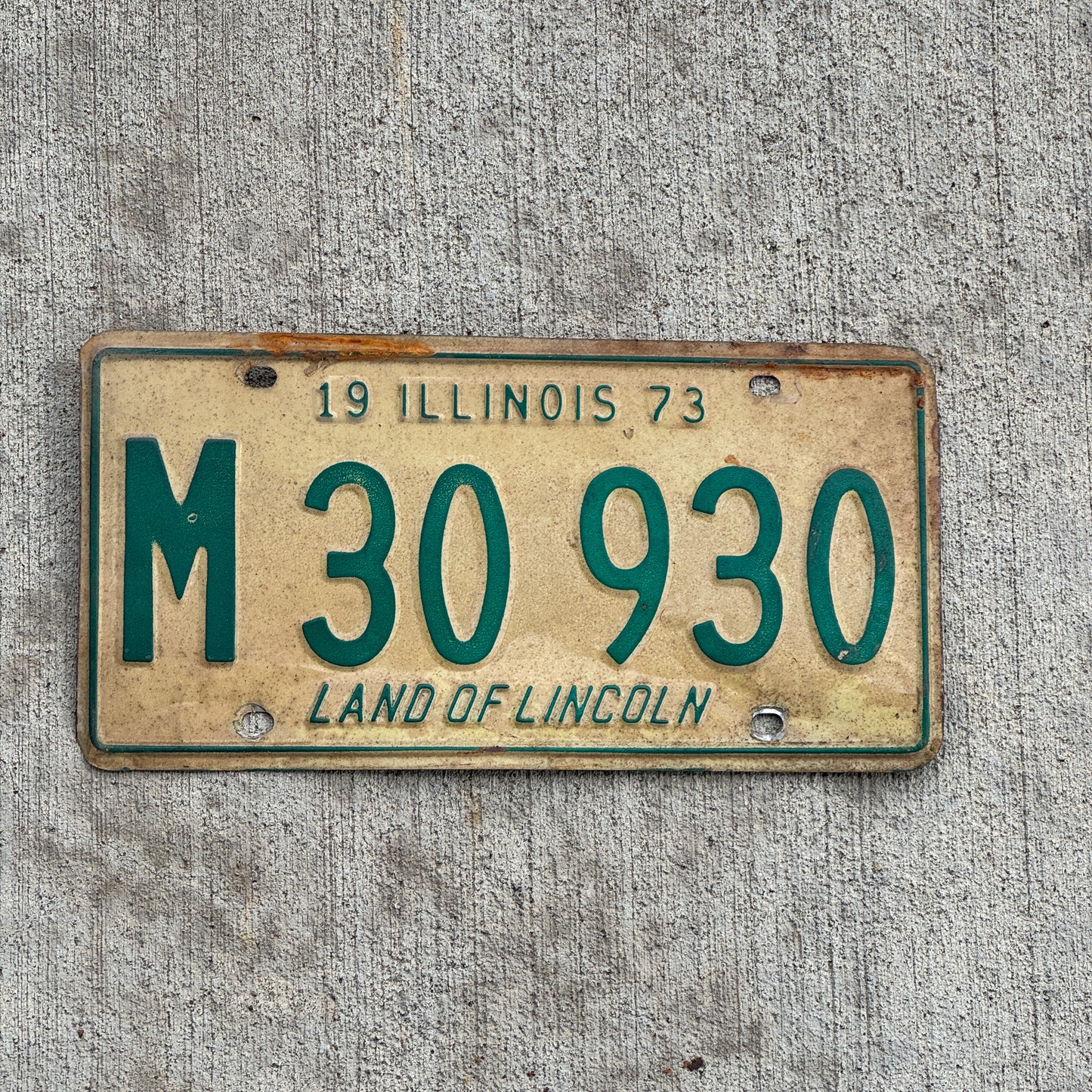 Photo of a 1973 Illinois Municipal License Plate Auto Tag 2 Vintage Garage M 30 930 with original patina