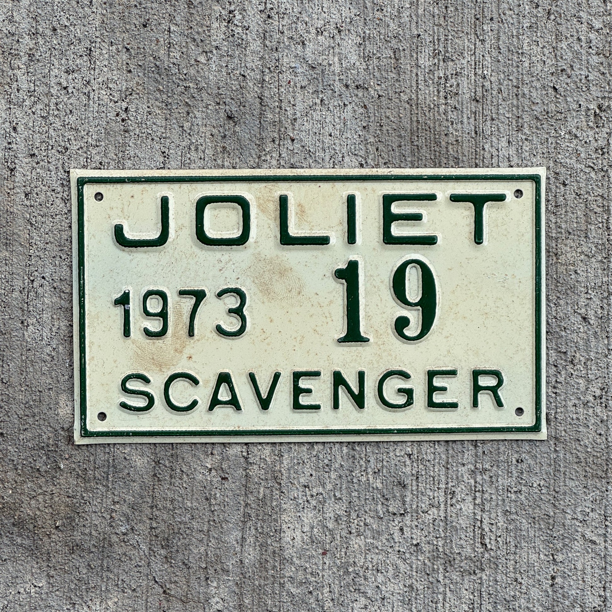 Photo of a 1973 Illinois Scavenger License Plate Auto Tag Garage Decor Vintage Joliet 19 with original patina
