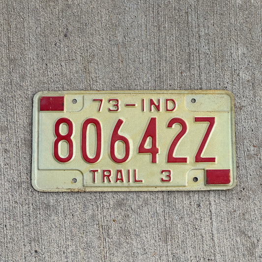 Photo of a 1973 Indiana Trailer License Plate Auto Tag Garage Decor Vintage 80642 Z with original patina