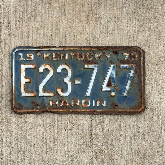 Photo of a 1973 Kentucky License Plate Auto Tag Garage Decor Vintage E23 747 with original patina