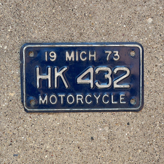 Photo of a 1973 Michigan Motorcycle License Plate Auto Tag Garage Decor Vintage HK 432