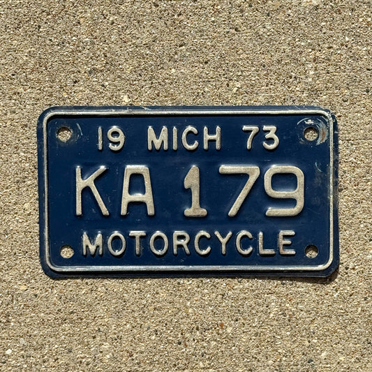 Photo of a 1973 Michigan Motorcycle License Plate Auto Tag Garage Decor Vintage KA 179