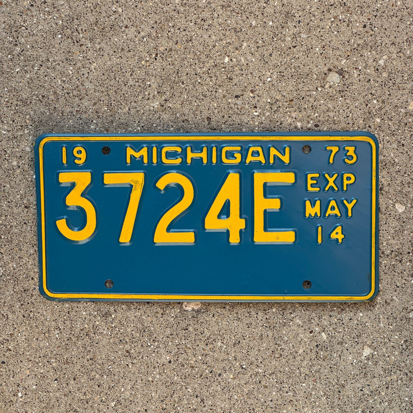 Photo of a 1973 Michigan Truck Half Year License Plate Auto Tag Garage Decor Vintage May 3724 E