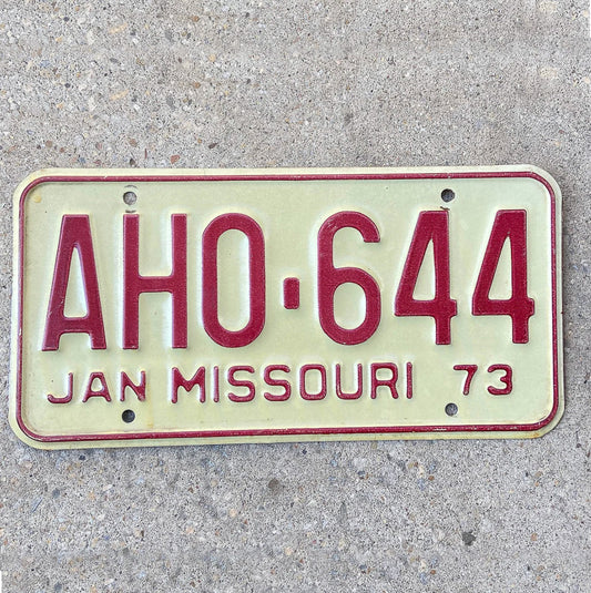 Photo of a 1973 Missouri License Plate Auto Tag Garage Decor Vintage AH0 644 with original patina