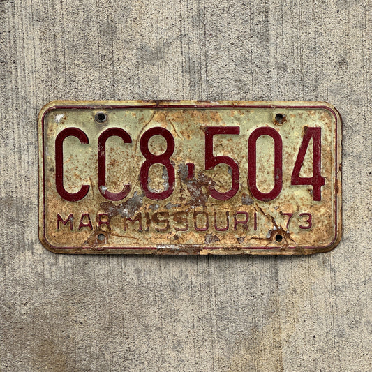 Photo of a 1973 Missouri License Plate Auto Tag Garage Decor Vintage CC 8 504 with original patina