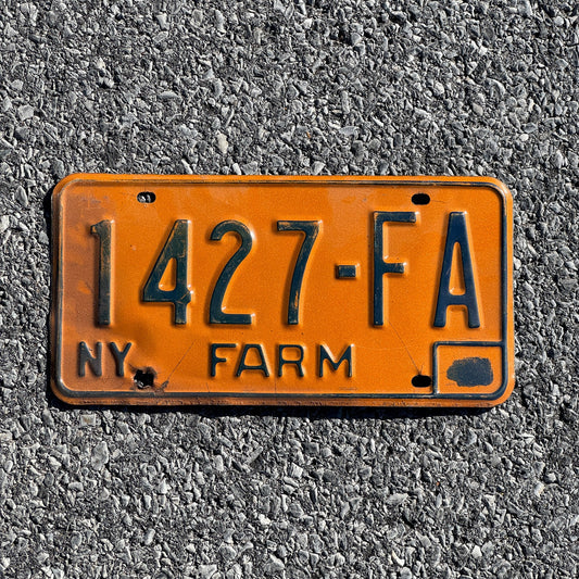Photo of a 1973 New York Farm License Plate Auto Tag Garage Decor Vintage 1427 FA