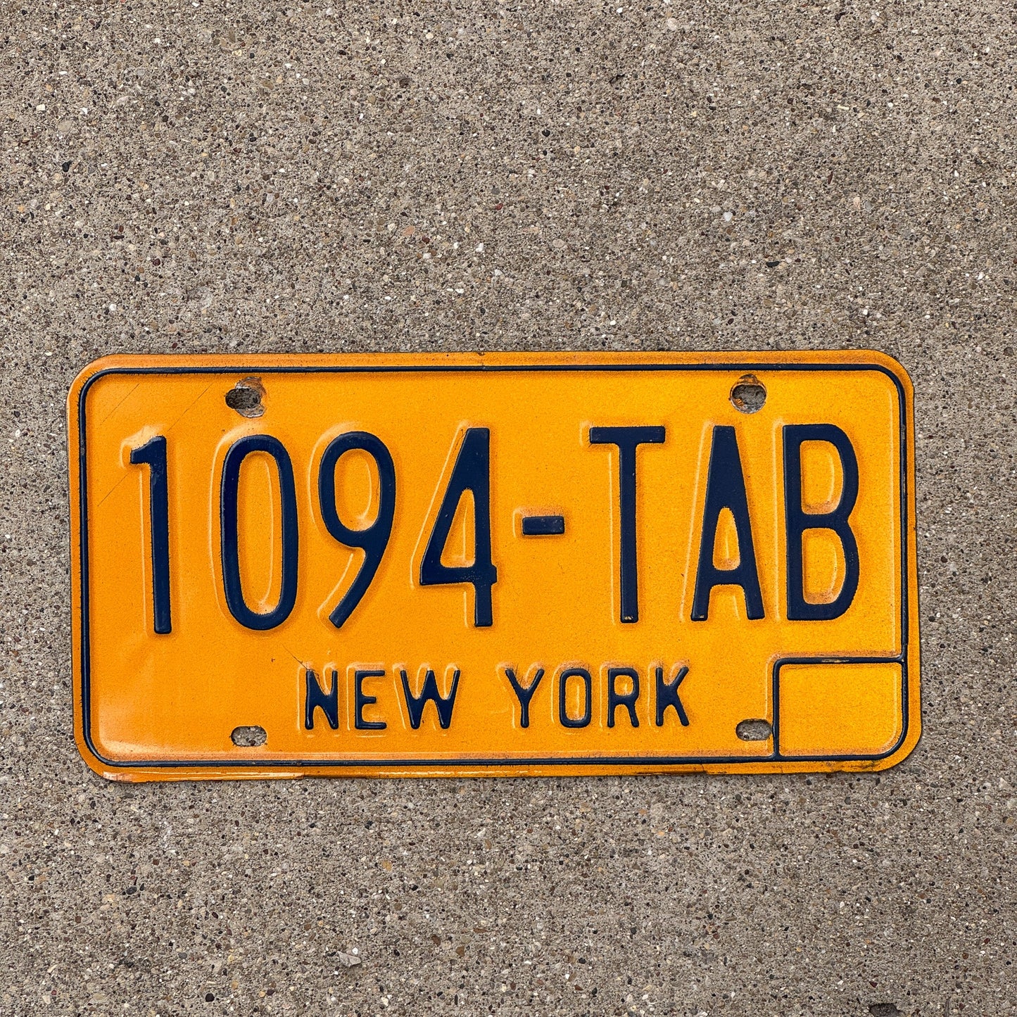 Photo of a 1973 New York License Plate Auto Tag Garage Decor Vintage 1094 TAB