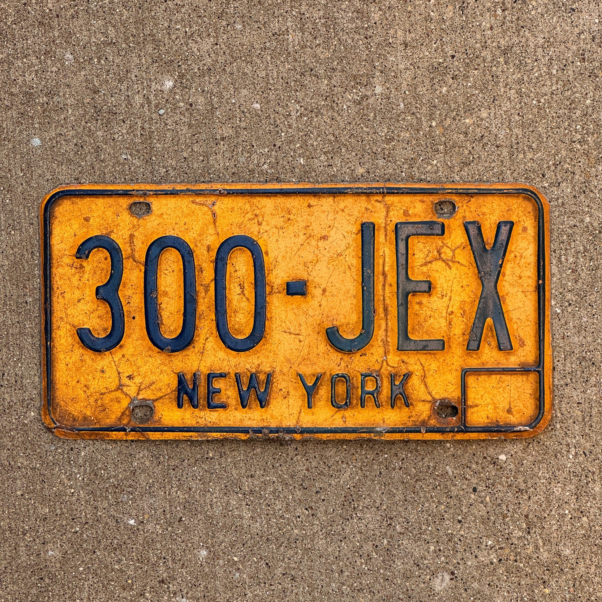 Photo of a 1973 New York License Plate Auto Tag Garage Decor Vintage 300 JEX with original patina