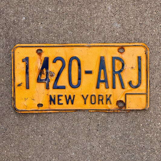 Photo of a 1973 New York License Plate Auto Tag Garage Decor Vintage 420 Weed Smoke 1420 ARJ with original patina
