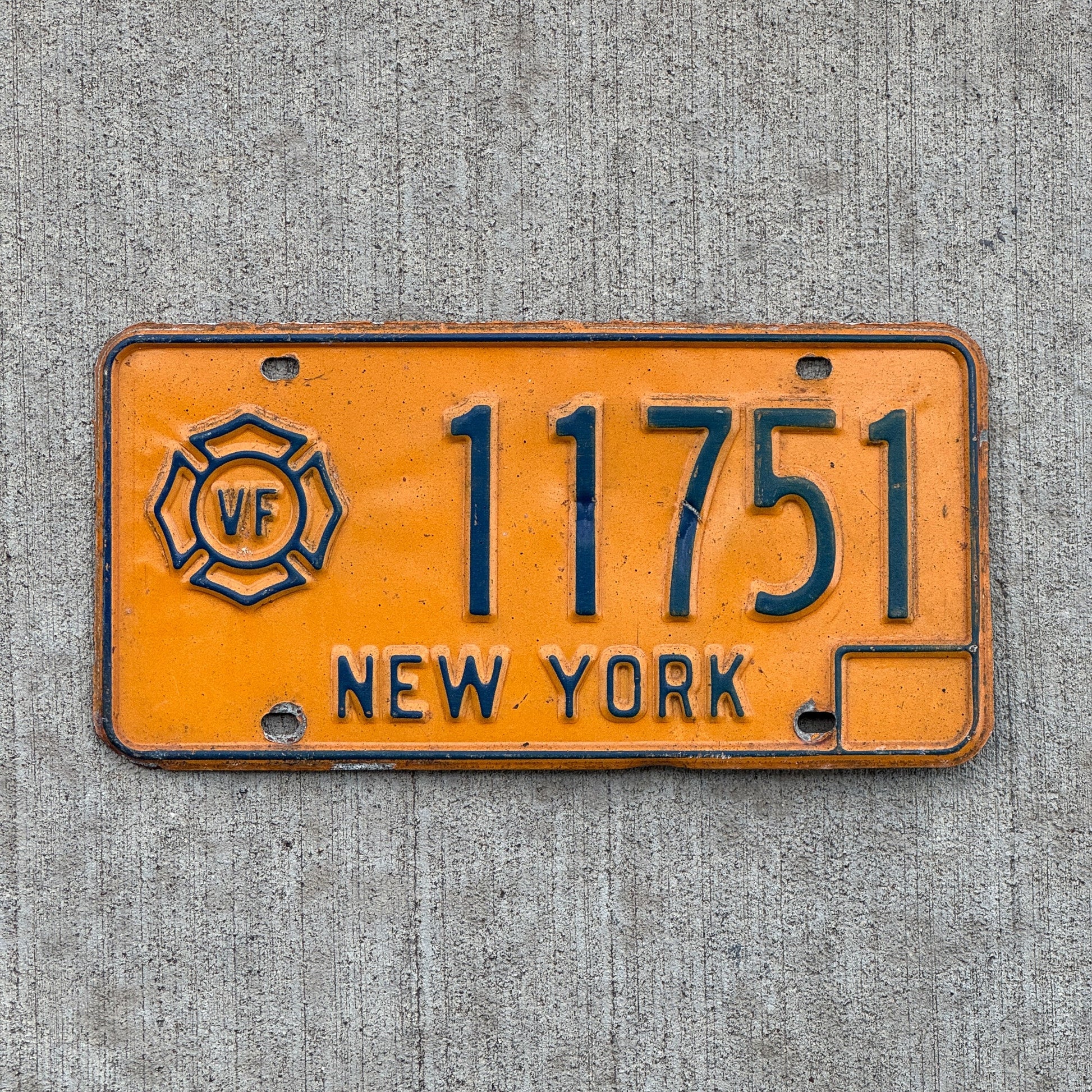 Photo of a 1973 New York VOLUNTEER FIREFIGHTER License Plate Auto Tag Garage Decor Vintage 11751
