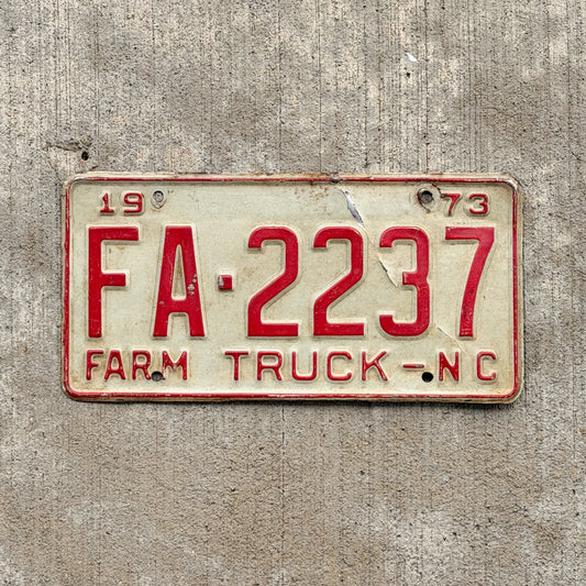 Photo of a 1973 North Carolina Farm Truck License Plate Auto Tag Garage Decor Vintage FA 2237 with original patina
