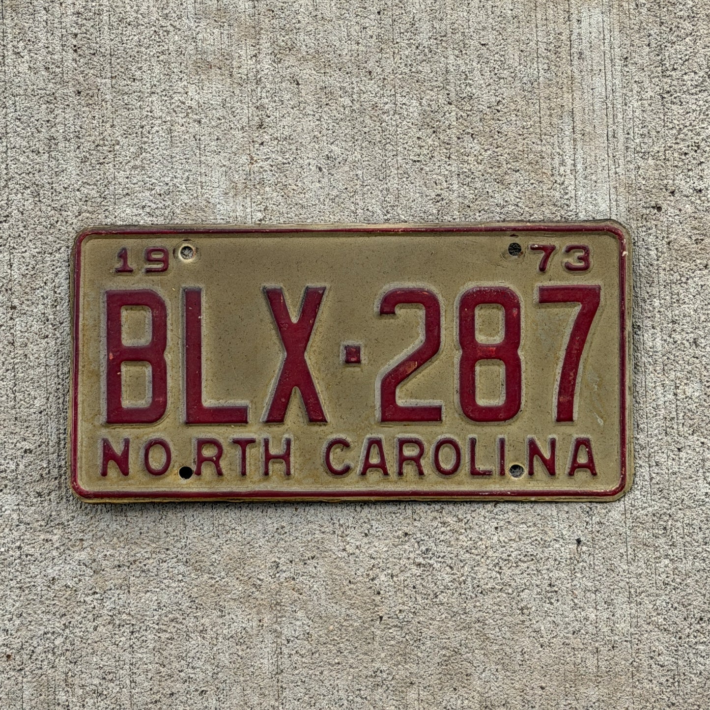 Photo of a 1973 North Carolina License Plate Auto Tag Garage Decor Vintage BLX 287 with original patina
