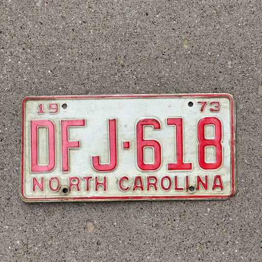 Photo of a 1973 North Carolina License Plate Auto Tag Garage Decor Vintage DFJ 618 with original patina