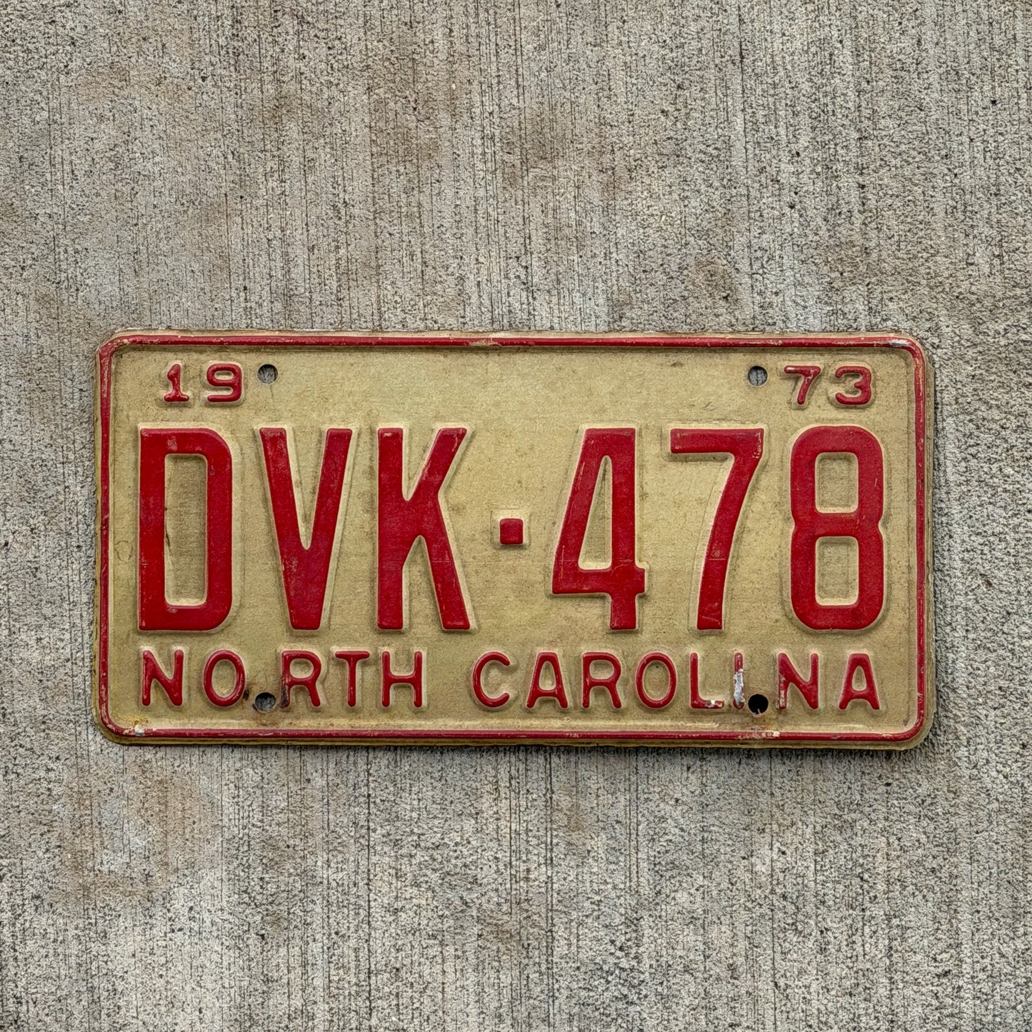 Photo of a 1973 North Carolina License Plate Auto Tag Garage Decor Vintage DVK 478 with original patina