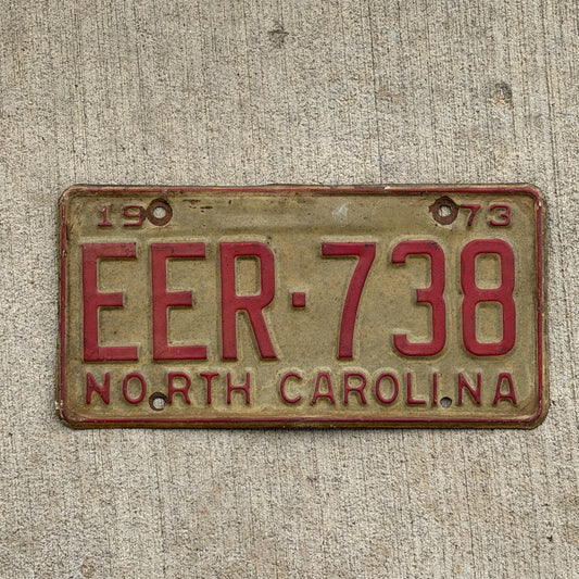 Photo of a 1973 North Carolina License Plate Auto Tag Garage Decor Vintage EER 738 with original patina