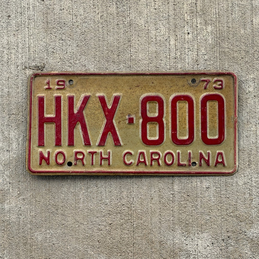 Photo of a 1973 North Carolina License Plate Auto Tag Garage Decor Vintage HKX 800 with original patina
