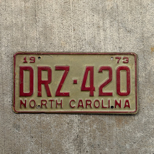Photo of a 1973 North Carolina License Plate Auto Tag Garage Decor Vintage Weed Smoke DRZ 420 with original patina