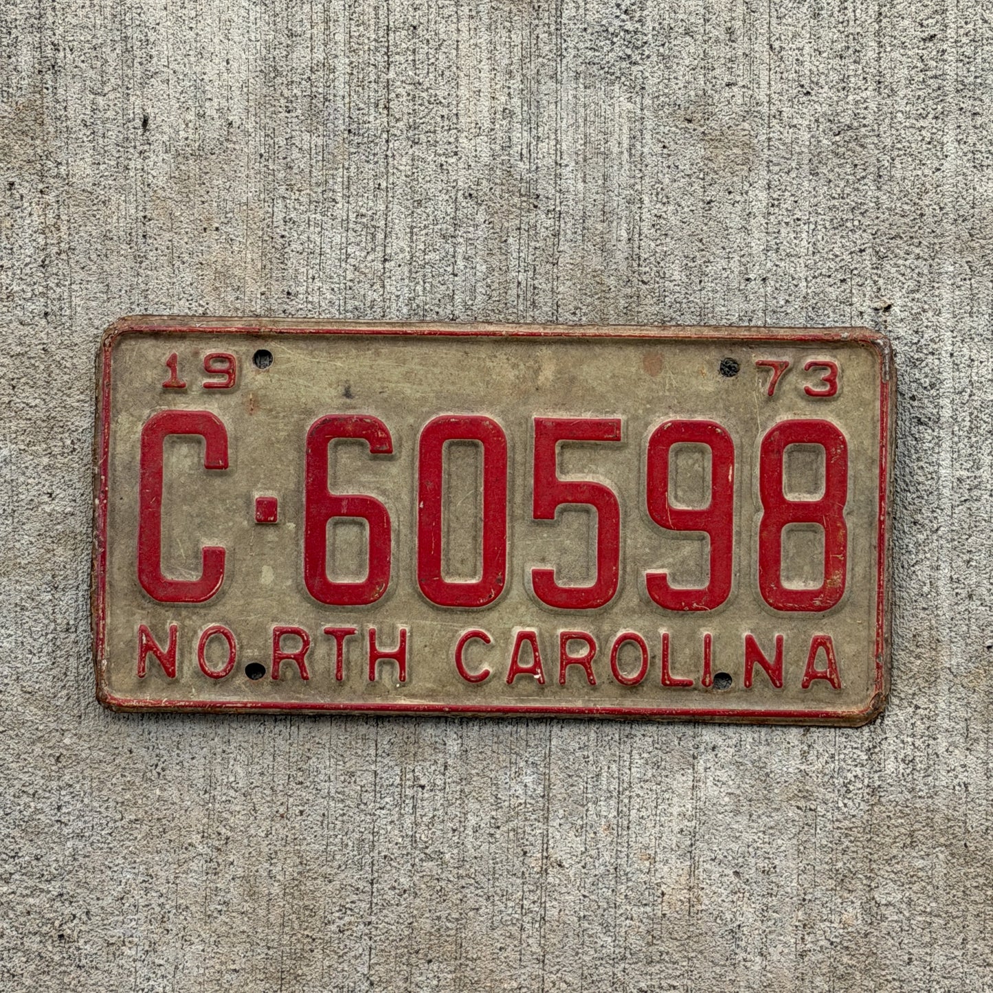Photo of a 1973 North Carolina Trailer License Plate Auto Tag Garage Decor Vintage Private Trailer C 60598 with original patina