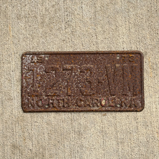 Photo of a 1973 North Carolina Truck License Plate Auto Tag Garage Decor Vintage 1273 VM with original patina