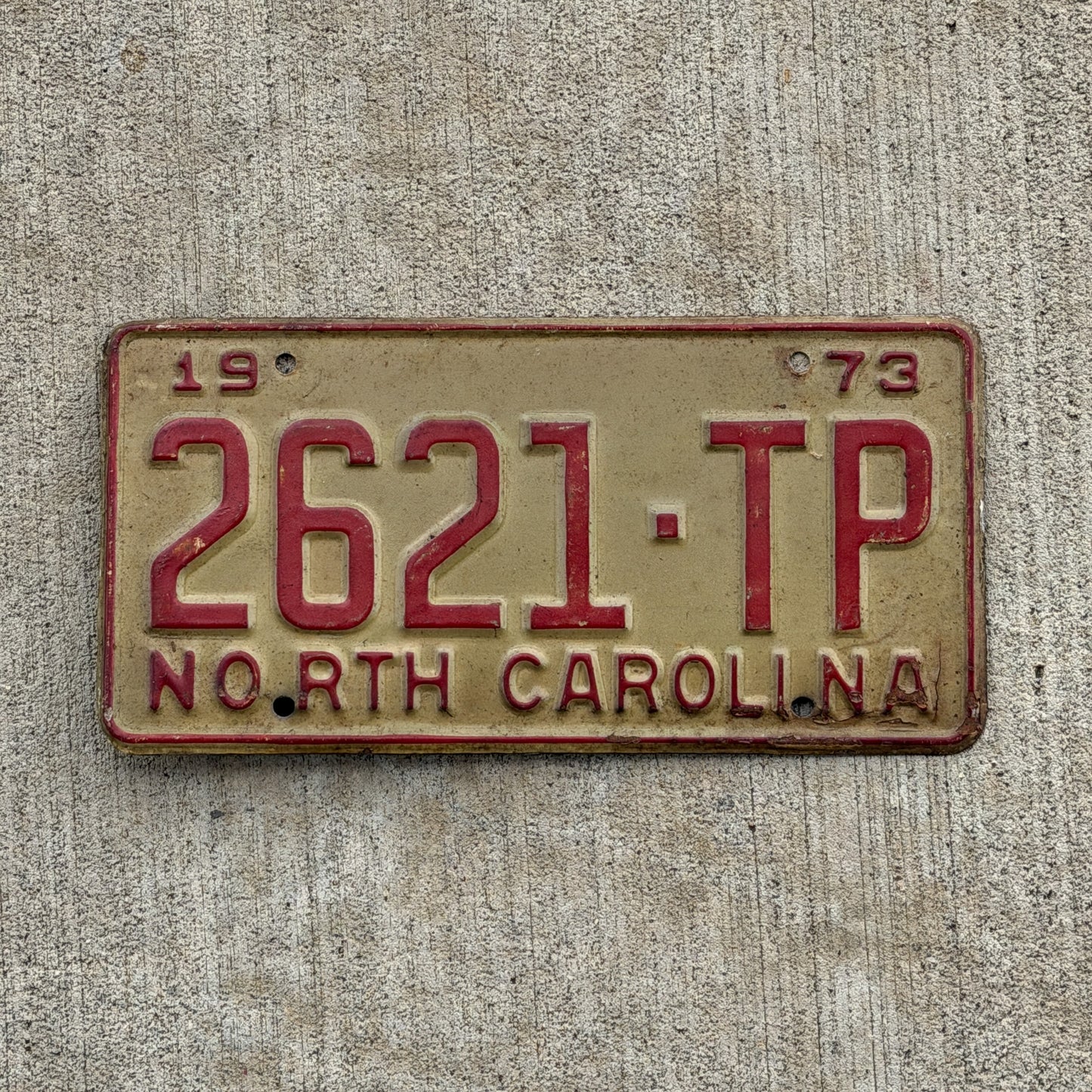 Photo of a 1973 North Carolina Truck License Plate Auto Tag Garage Decor Vintage 2621 TP with original patina