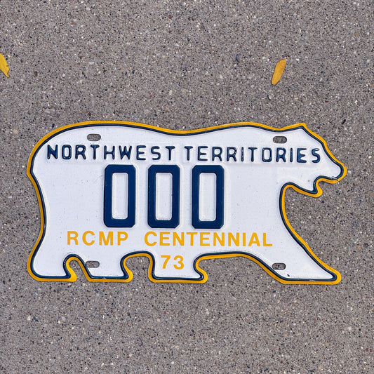 Photo of a 1973 Northwest Territories Sample License Plate Auto Tag Garage Decor Vintage RCMP Centennial Polar Bear 000