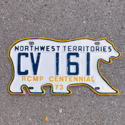 Photo of a 1973 Northwest Territories Truck License Plate Auto Tag Garage Decor Vintage RCMP Centennial Polar Bear CV 161