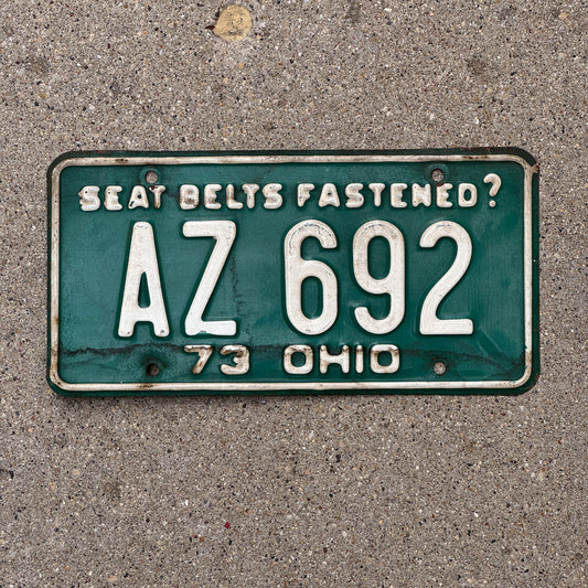 Photo of a 1973 Ohio License Plate Auto Tag Garage Decor Vintage AZ 692 with original patina