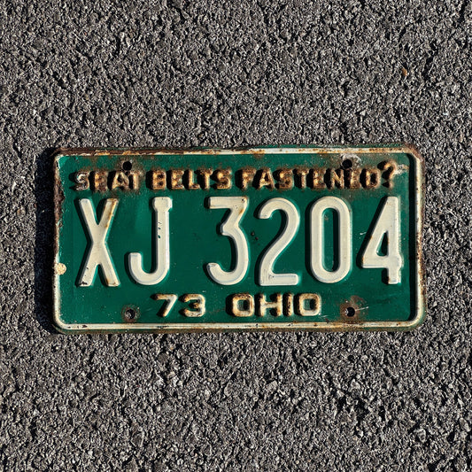 Photo of a 1973 Ohio License Plate Auto Tag Garage Decor Vintage XJ 3204