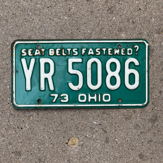 Photo of a 1973 Ohio License Plate Auto Tag Garage Decor Vintage YR 5086 with original patina