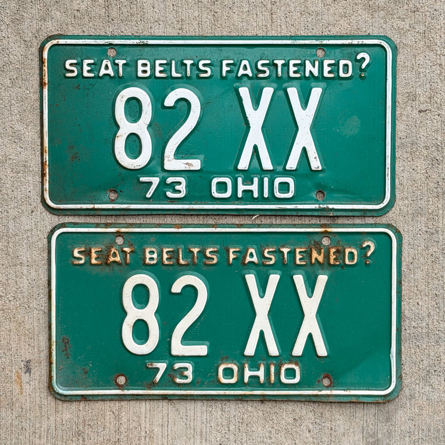 Photo of a 1973 Ohio License Plate Pair Auto Tag Garage Decor Vintage 82 XX with original patina