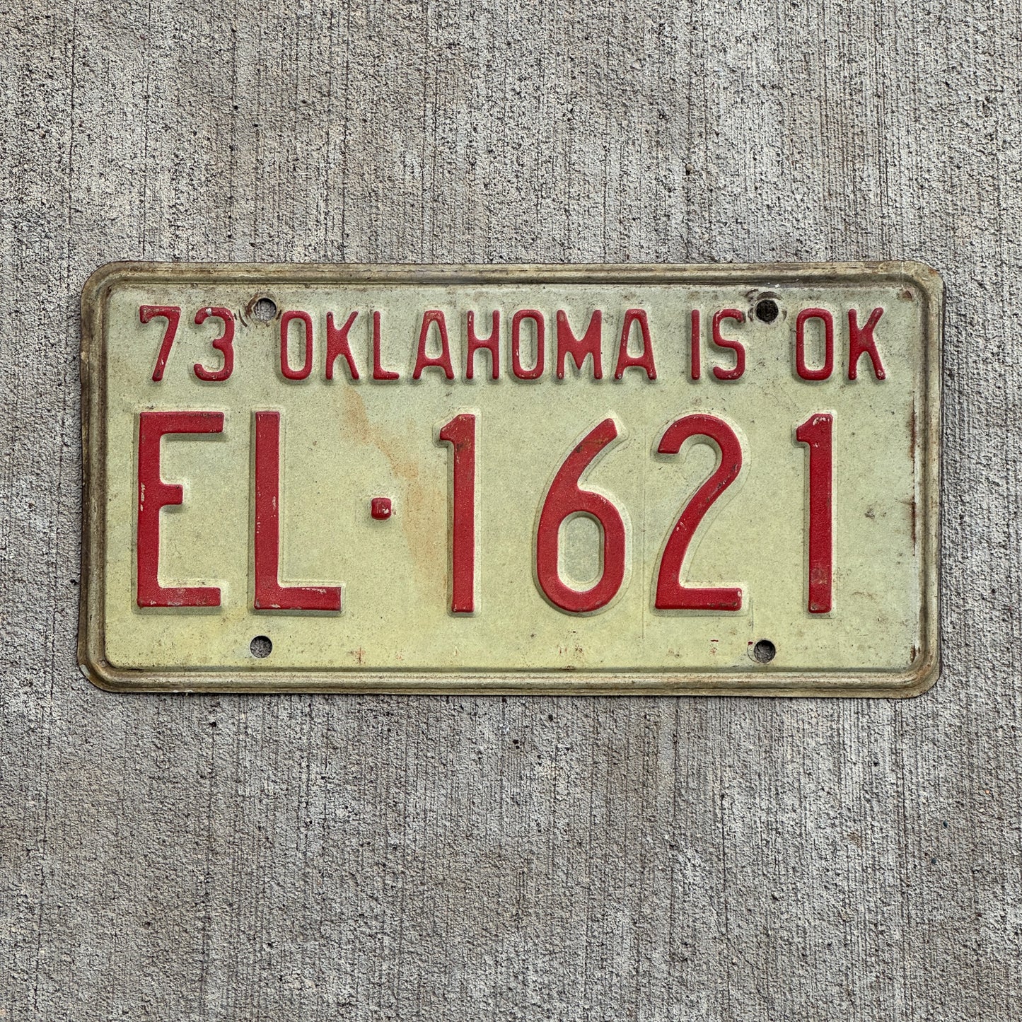 Photo of a 1973 Oklahoma License Plate Auto Tag Garage Decor Vintage EL 1621 with original patina