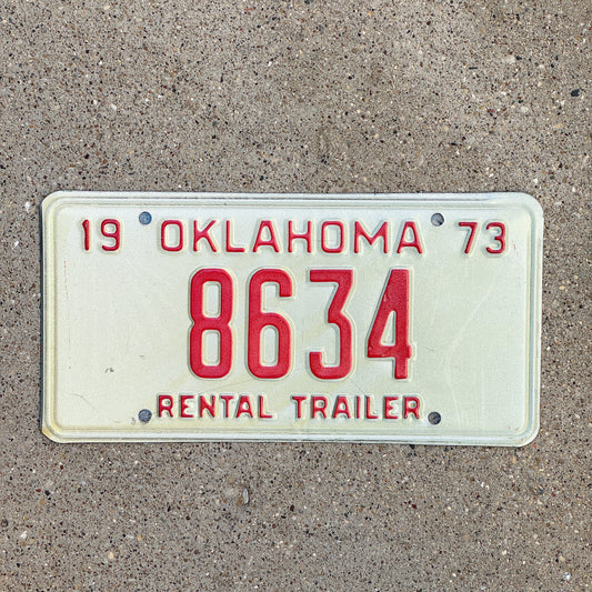Photo of a 1973 Oklahoma Rental Trailer License Plate Auto Tag Garage Decor Vintage 8634 with original patina