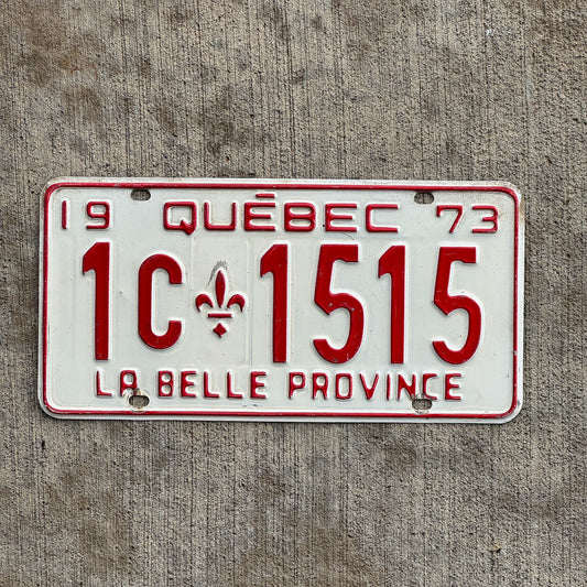 Photo of a 1973 Quebec License Plate Auto Tag Garage Decor Vintage 1C 1515 with original patina