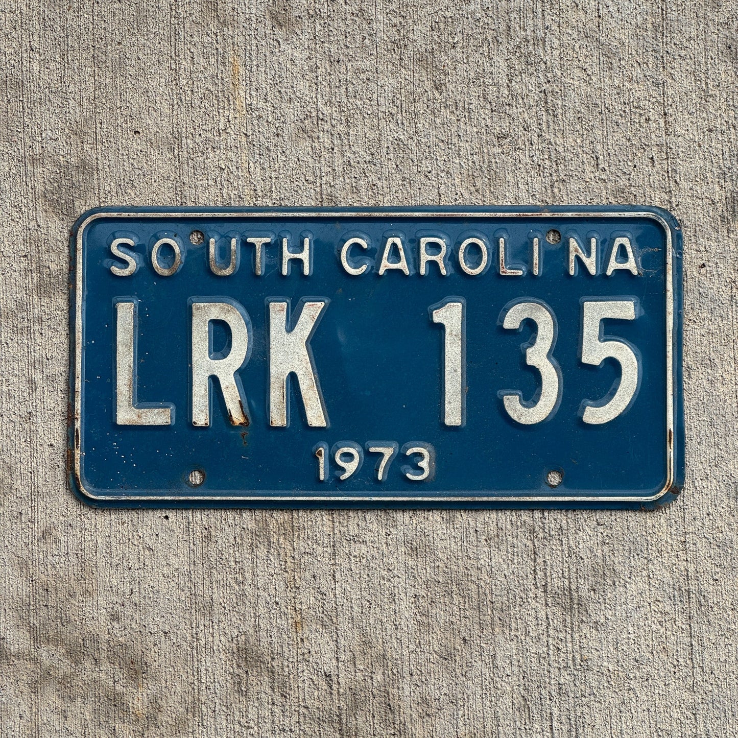 Photo of a 1973 South Carolina License Plate Auto Tag 1 Garage Decor LRK 135 with original patina
