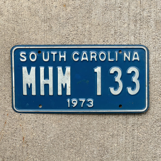 Photo of a 1973 South Carolina License Plate Auto Tag Garage Decor Vintage MHM 133 with original patina