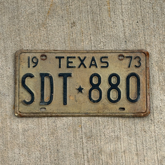 Photo of a 1973 Texas License Plate Auto Tag Garage Decor Vintage SDT 880 with original patina