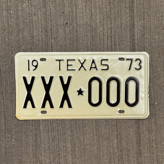Photo of a 1973 Texas SAMPLE License Plate Auto Tag Garage Decor Vintage XXX 000