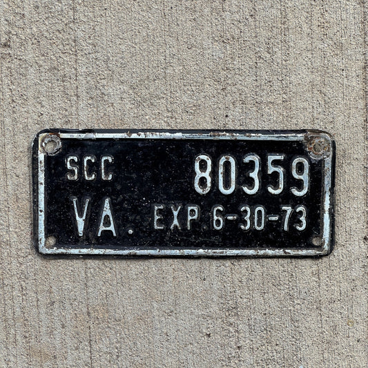 Photo of a 1973 Virginia Commerce Commission License Plate Auto Tag Garage Decor Vintage SCC 80359