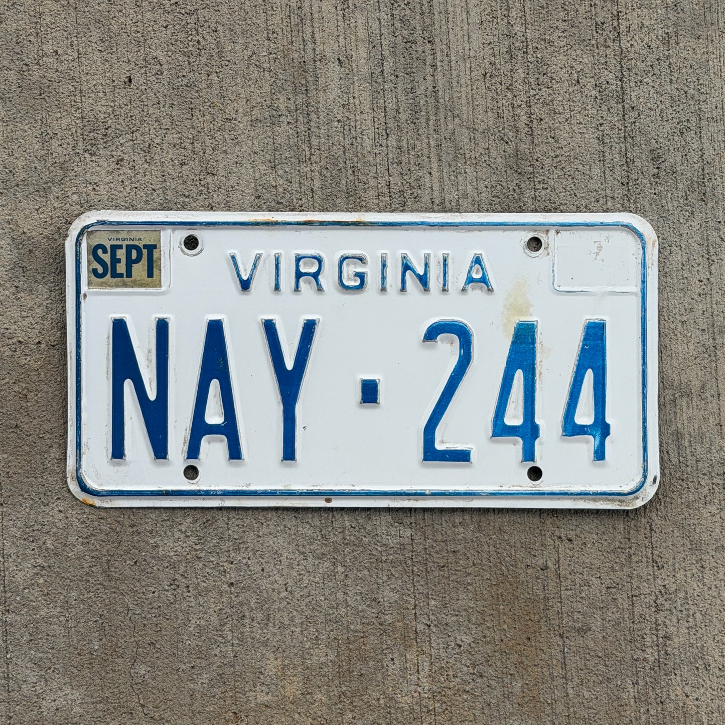 Photo of a 1973 Virginia License Plate Auto Tag Garage Decor Vintage NAY 244 with original patina