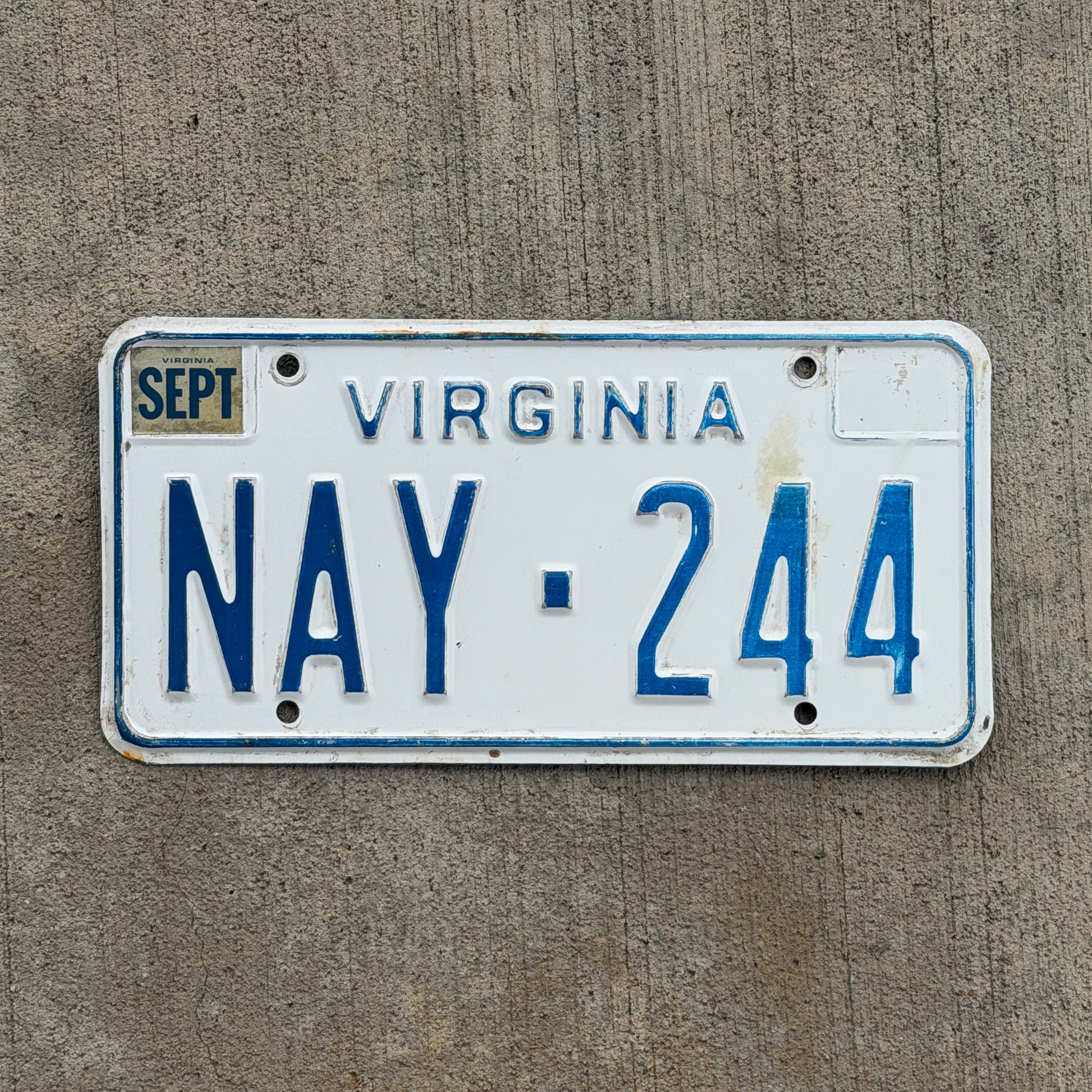 Photo of a 1973 Virginia License Plate Auto Tag Garage Decor Vintage NAY 244 with original patina