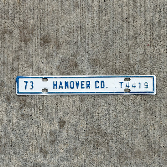 Photo of a 1973 Virginia Tax Strip License Plate Auto Tag Garage Decor Vintage Hanover County T 4419 with original patina